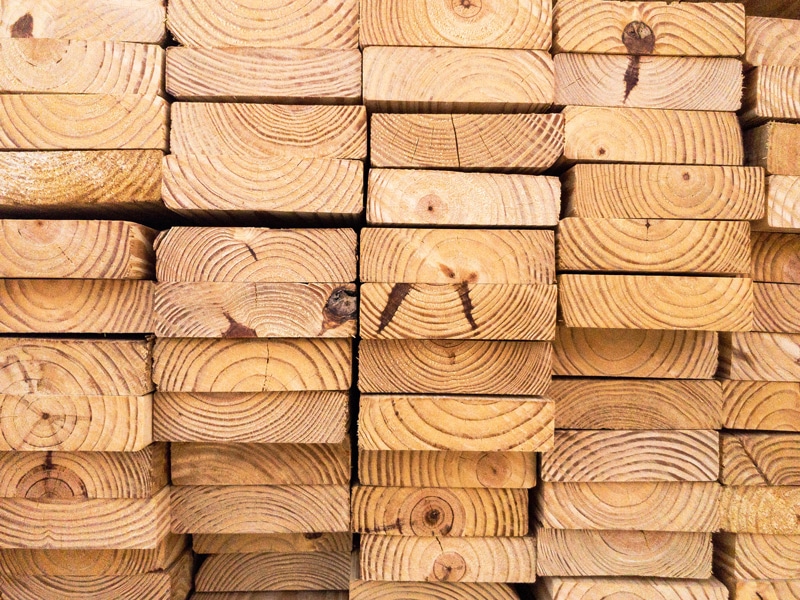 A large quantity of lumber neatly stacked